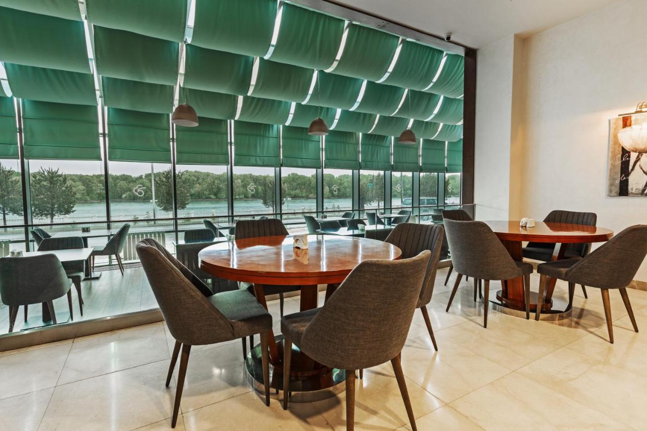 Dedeman Oskemen Tavros Hotel Ustʼ-Kamenogorsk Εξωτερικό φωτογραφία The restaurant