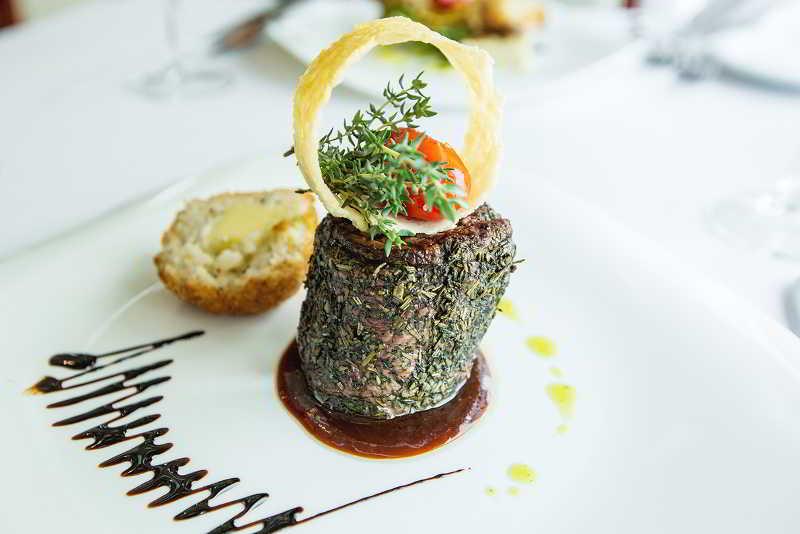 Dedeman Oskemen Tavros Hotel Ustʼ-Kamenogorsk Εξωτερικό φωτογραφία A steak au poivre prepared in a restaurant