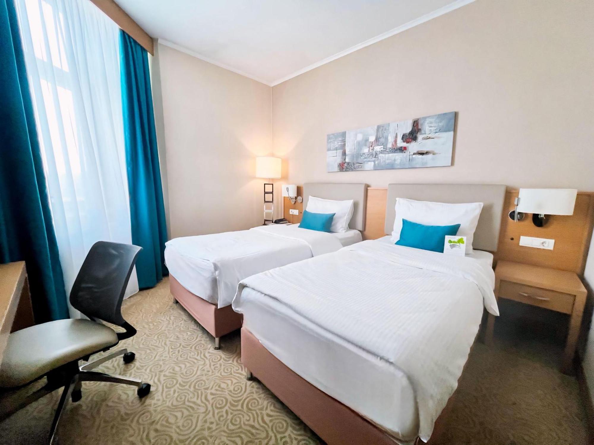 Dedeman Oskemen Tavros Hotel Ustʼ-Kamenogorsk Δωμάτιο φωτογραφία
