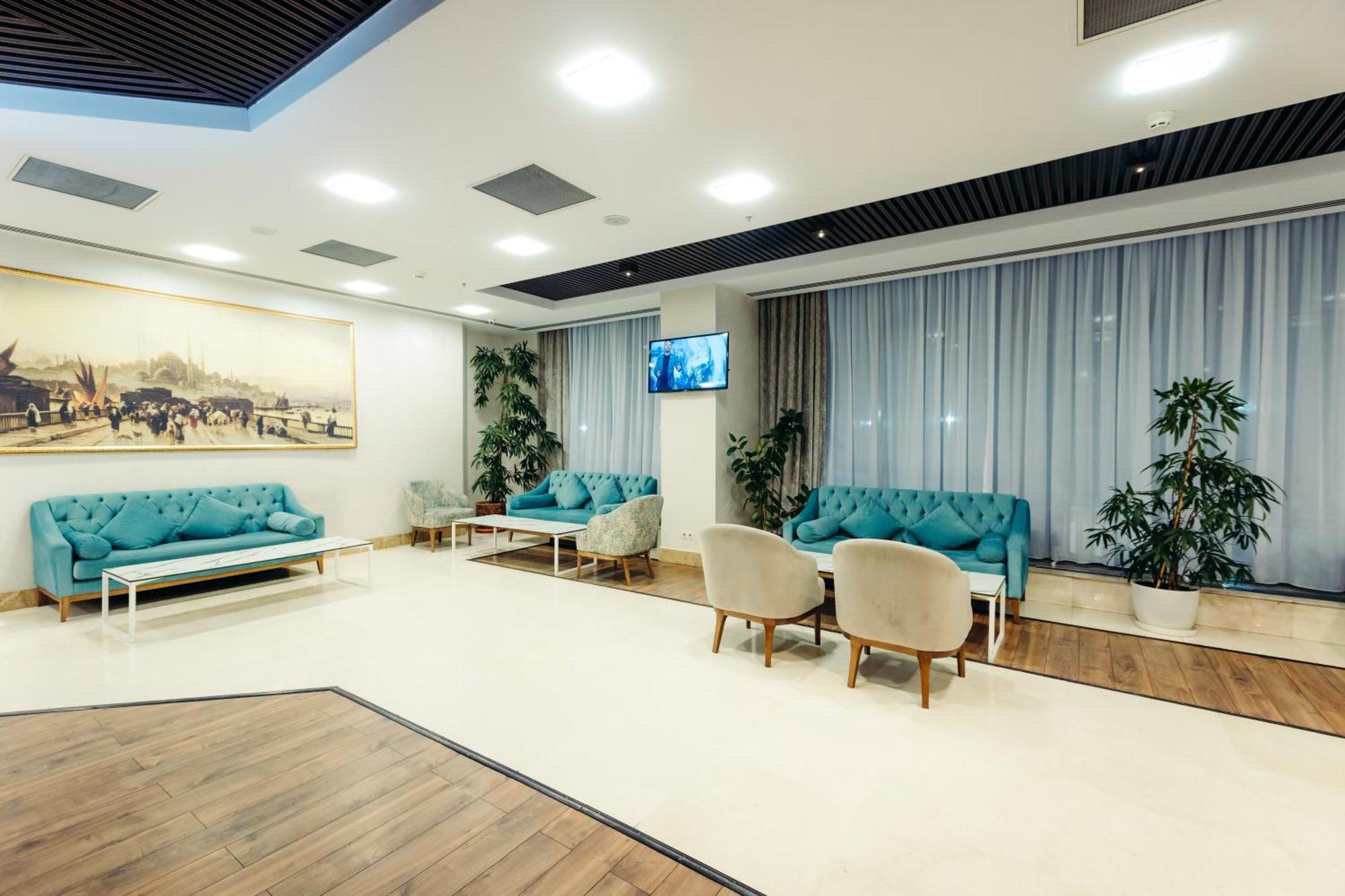 Dedeman Oskemen Tavros Hotel Ustʼ-Kamenogorsk Εξωτερικό φωτογραφία The lobby of the university library