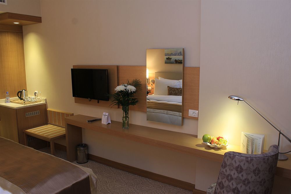Dedeman Oskemen Tavros Hotel Ustʼ-Kamenogorsk Εξωτερικό φωτογραφία A room at the hotel